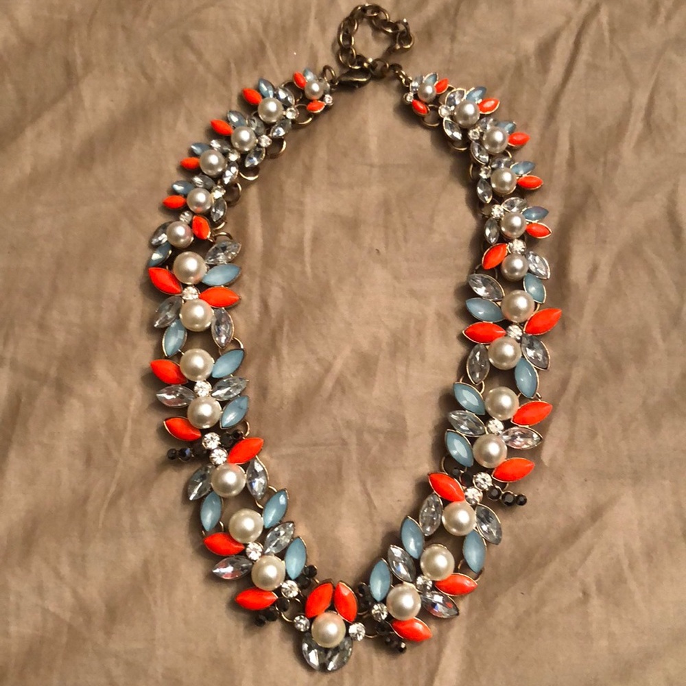 Orange, pearl, blue bead necklace.